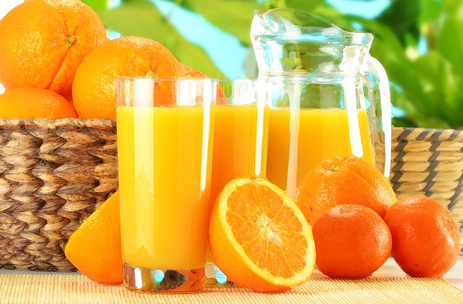 composition-with-two-glasses-of-orange-juice-and-fruits-t-monticello.jpg